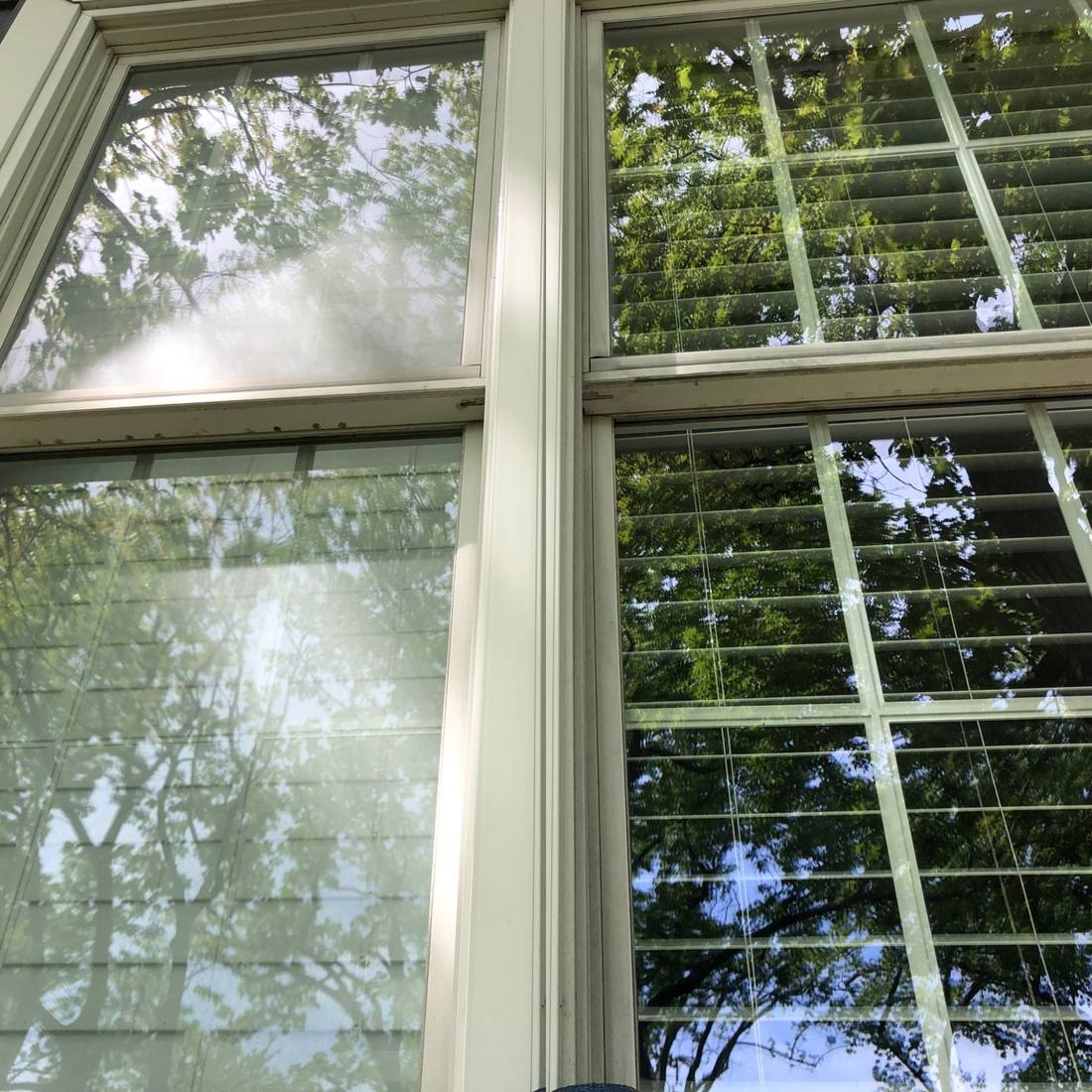Double-hung windows washed by hand